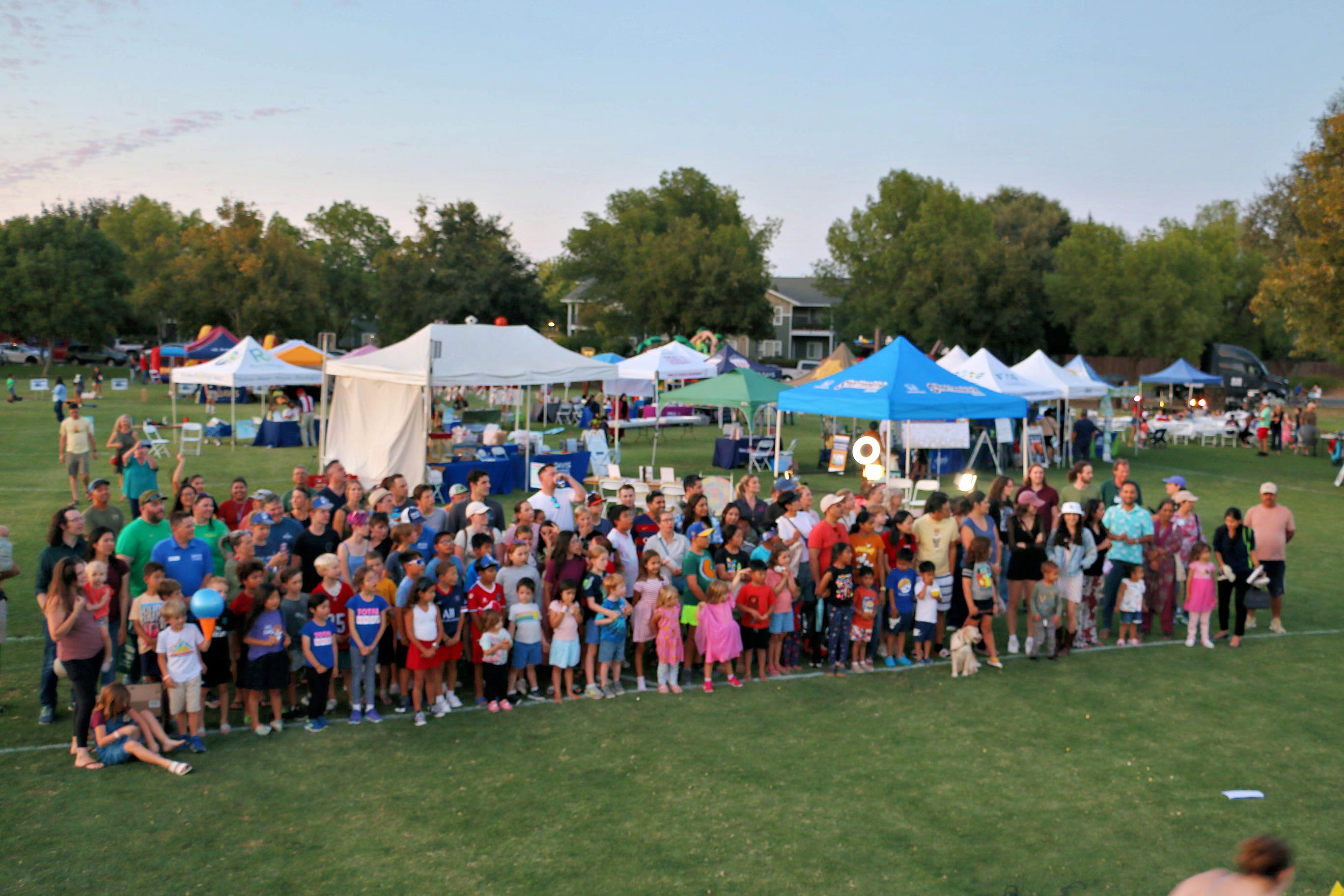 Davis Chamber community group photo at golden hour