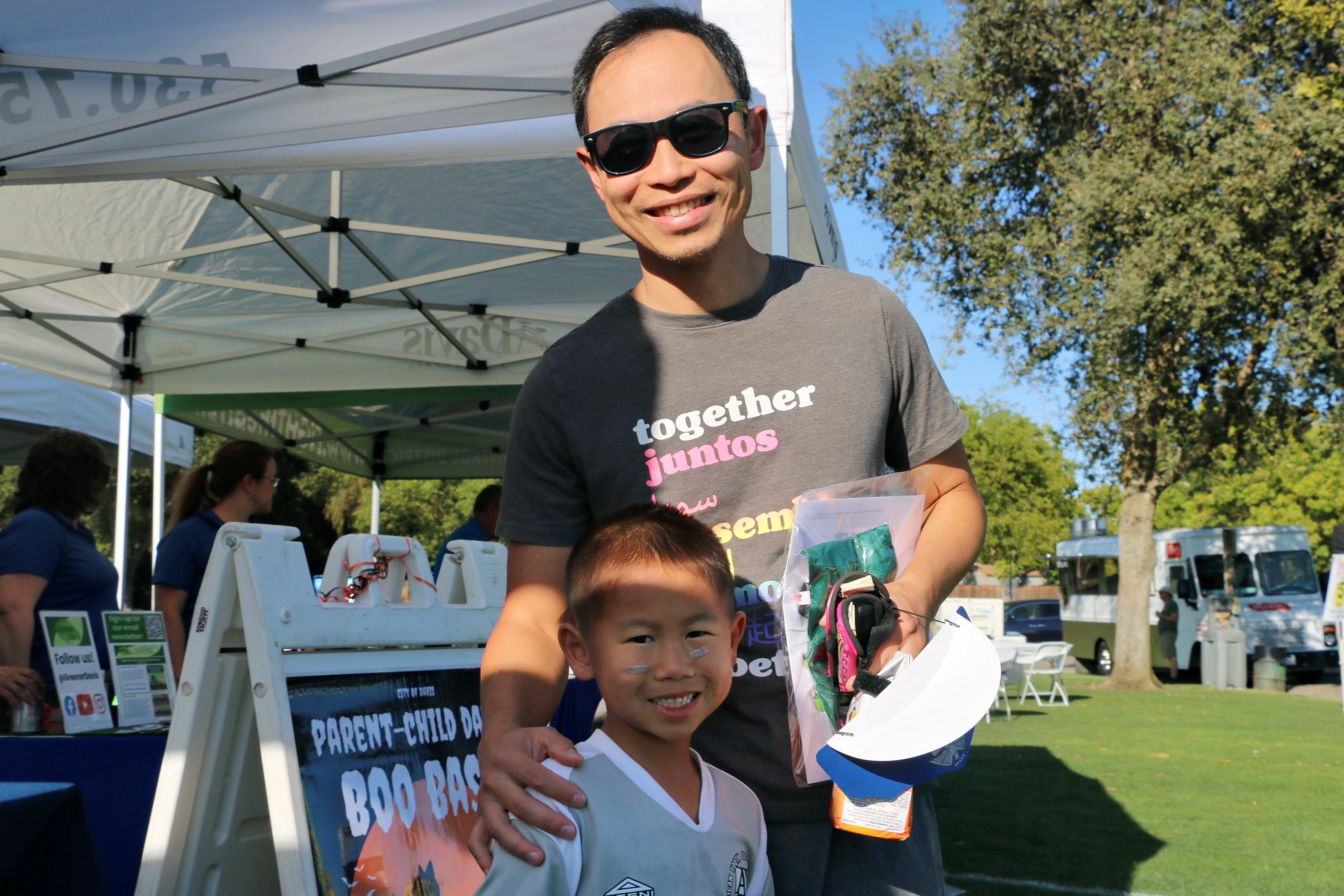 Father and son at Davis community event
